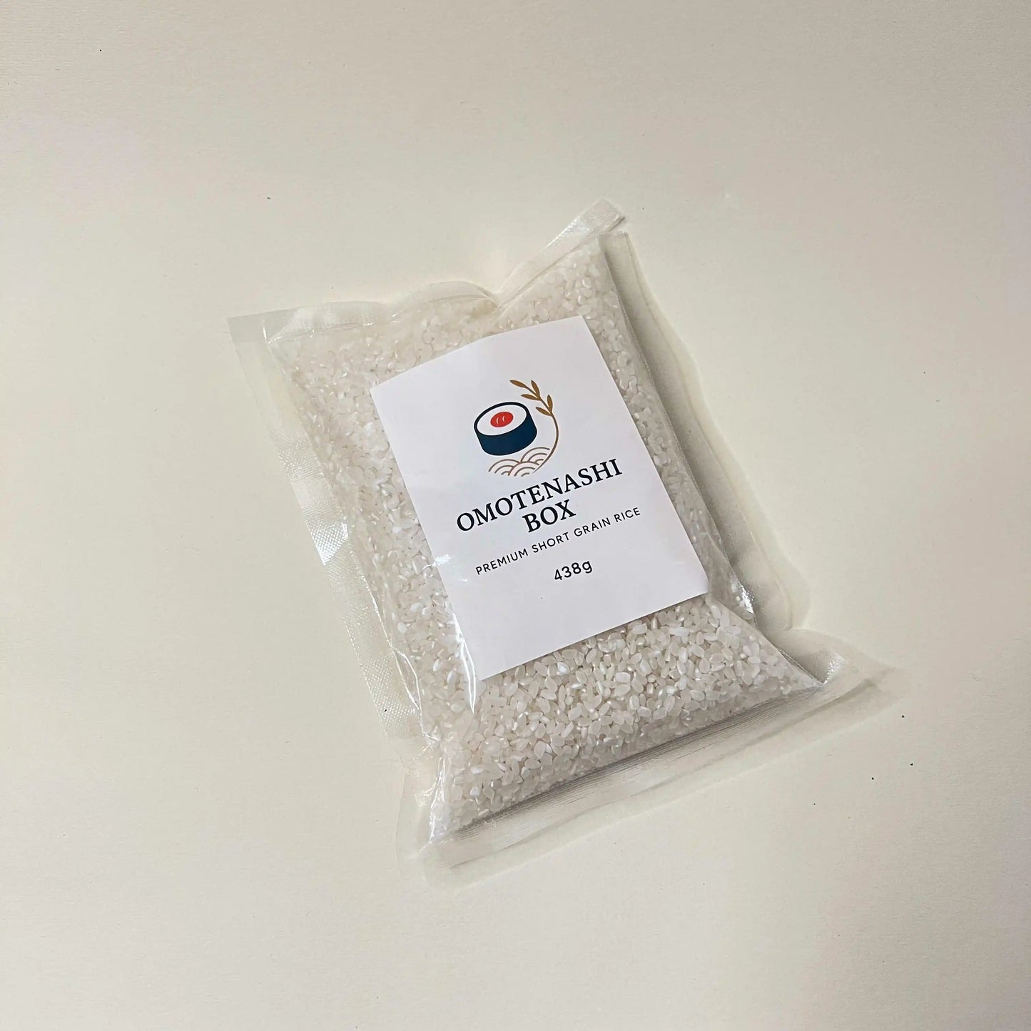 Packaged rice with Omotenashi Box label on a white background