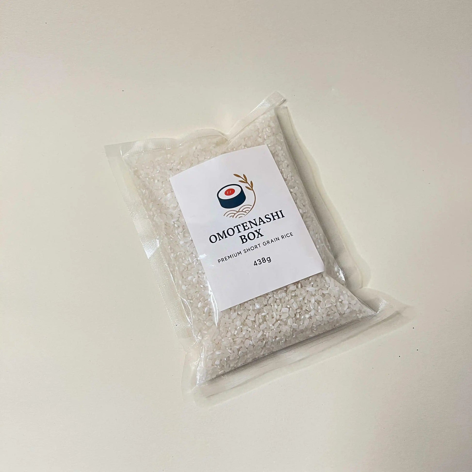 Packaged rice with Omotenashi Box label on a white background