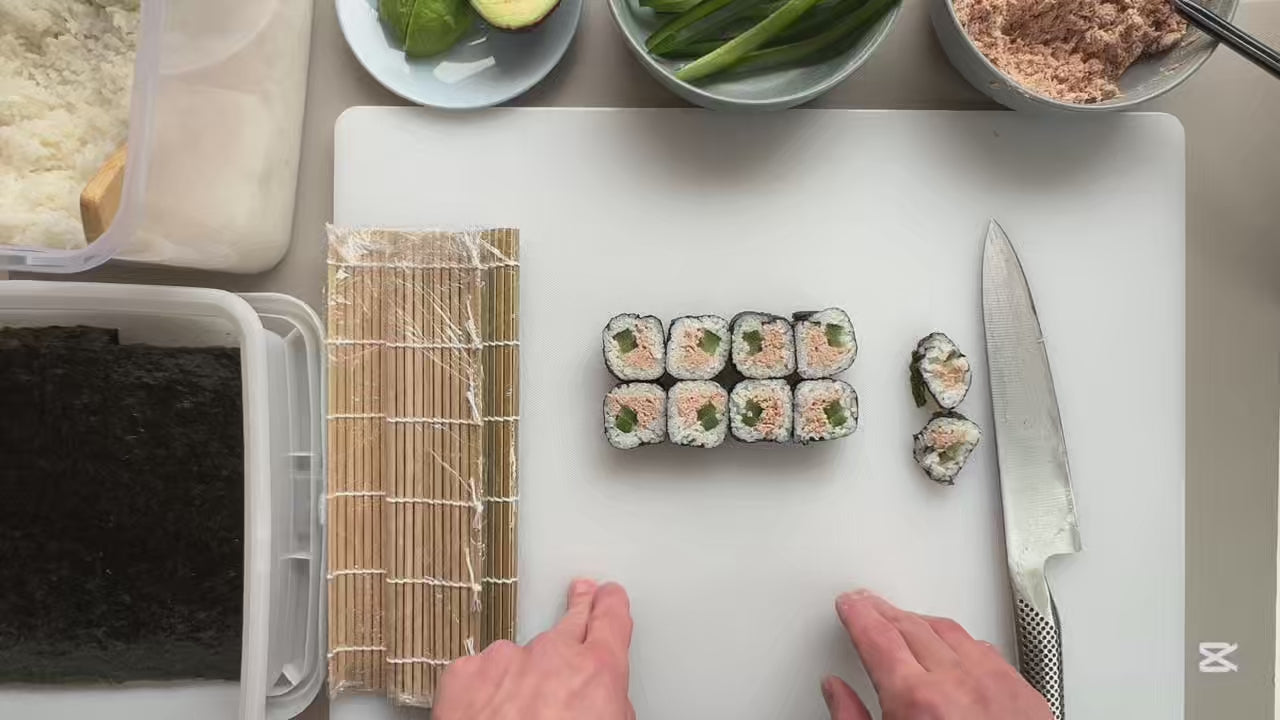Load video: Rolling a Maki tuna sushi roll